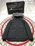 Moose Knuckles Men's Black Quilted Parka with Gray Fur-Style Hood Trim