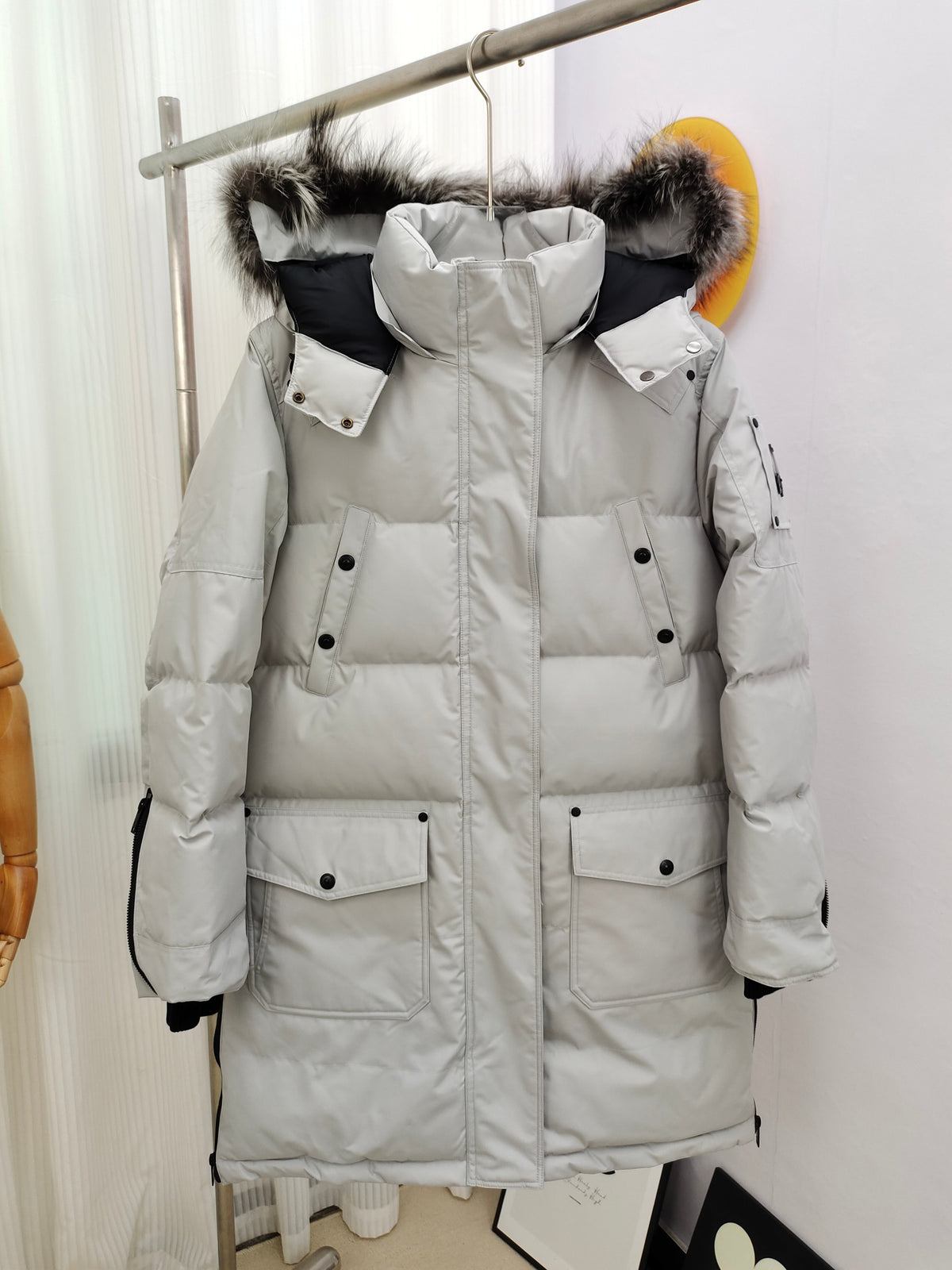 Moose Knuckles Women's Light Gray Long Parka with Fur-Style Hood Trim