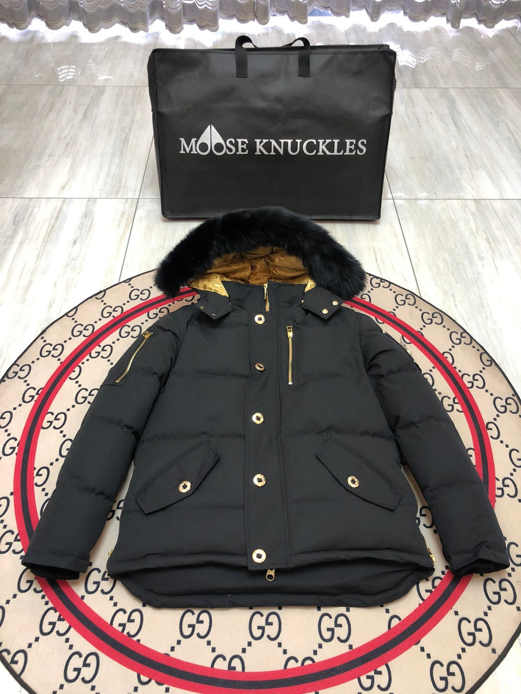 Moose Knuckles Men's Black Hooded Jacket with Gold-Tone Details